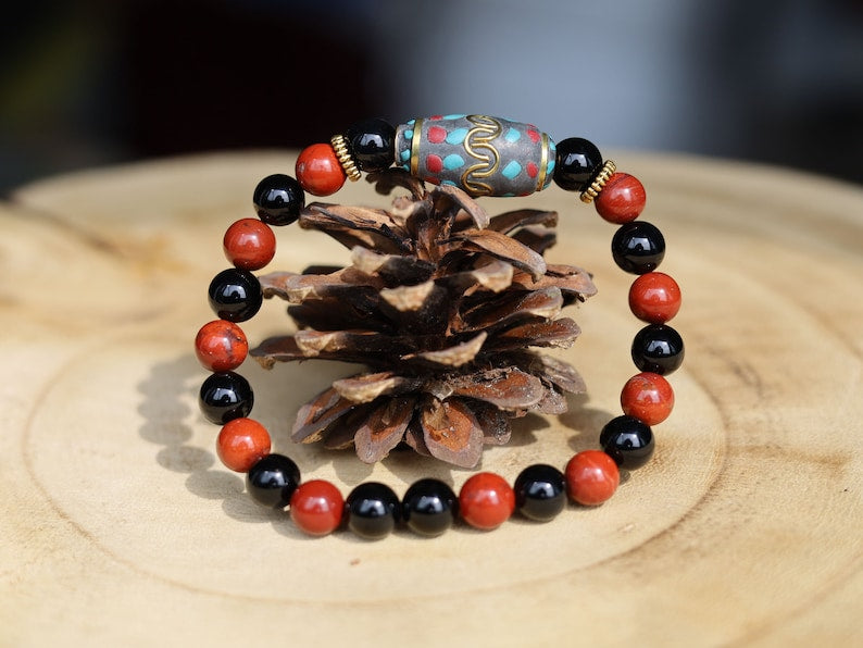 Beautiful & very special prayer bead from Nepal with Natural Black Agate and Red Rainbow Jasper Beads. Expressing your taste and style.