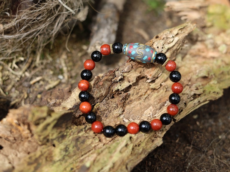 Beautiful & very special prayer bead from Nepal with Natural Black Agate and Red Rainbow Jasper Beads. Expressing your taste and style.