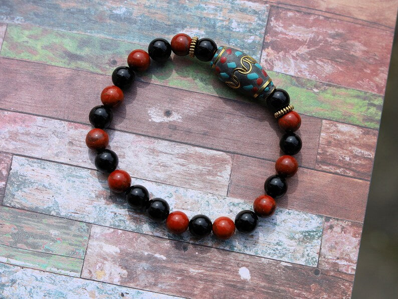 Beautiful & very special prayer bead from Nepal with Natural Black Agate and Red Rainbow Jasper Beads. Expressing your taste and style.