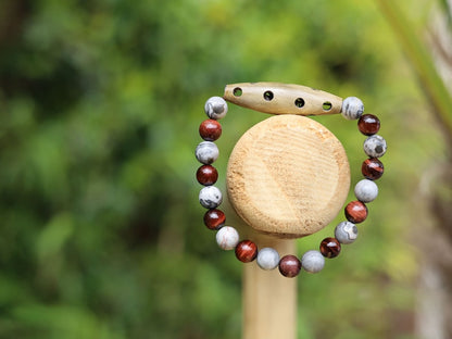 A beautiful large Horn bead with  Picasso Jasper  and red tiger eye beads. express your individuality and unique style.