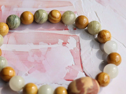 Sesame Jasper/Kiwi Jasper Beads bracelet with Wood lace Agate beads and egg shaped Terracotta bead. and is sure to make you smile