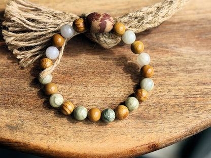 Sesame Jasper/Kiwi Jasper Beads bracelet with Wood lace Agate beads and egg shaped Terracotta bead. and is sure to make you smile