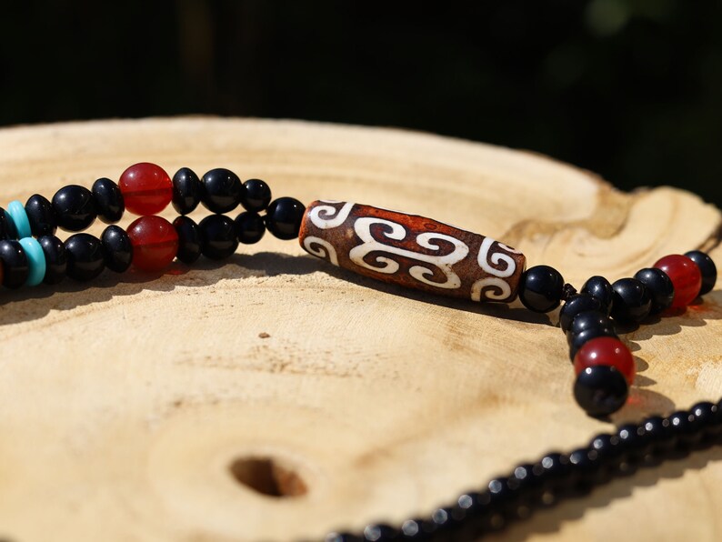 Tibetan Curved Ruyi Pattern Dzi Beads necklace. Amulet for Happiness and Increases Access to Good Luck.  protective and healing properties