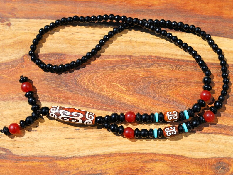Tibetan Curved Ruyi Pattern Dzi Beads necklace. Amulet for Happiness and Increases Access to Good Luck.  protective and healing properties