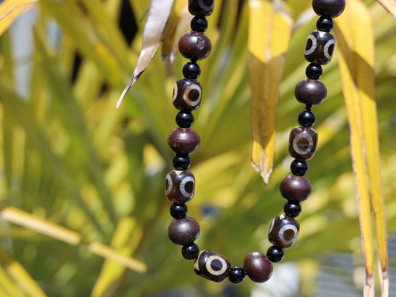 Jewelry set. 3-eyed black and white dzi necklace and bracelet. Wearing a 3-eye dzi bead  is believed to promote spiritual well-being