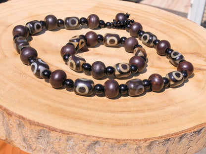 Jewelry set. 3-eyed black and white dzi necklace and bracelet. Wearing a 3-eye dzi bead  is believed to promote spiritual well-being