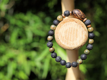 Kili seed bracelet with Lava and Olive Green Round Natural Wood Beads. Beautiful Disc coconut beads. Diffuser bracelets