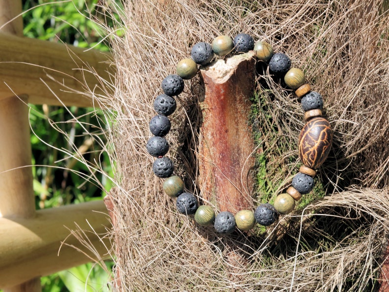 Kili seed bracelet with Lava and Olive Green Round Natural Wood Beads. Beautiful Disc coconut beads. Diffuser bracelets
