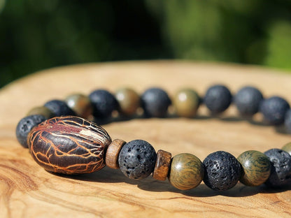 Kili seed bracelet with Lava and Olive Green Round Natural Wood Beads. Beautiful Disc coconut beads. Diffuser bracelets