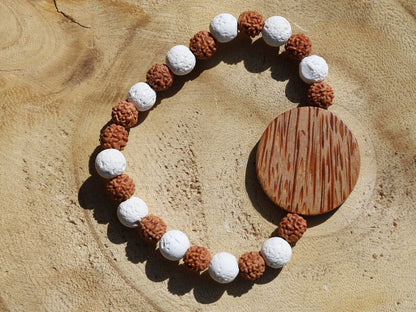 Beautiful, large Palm Wood bead with Lava and Round Rudraksha beads. Overall, white lava beads offer a unique  element to jewelry designs