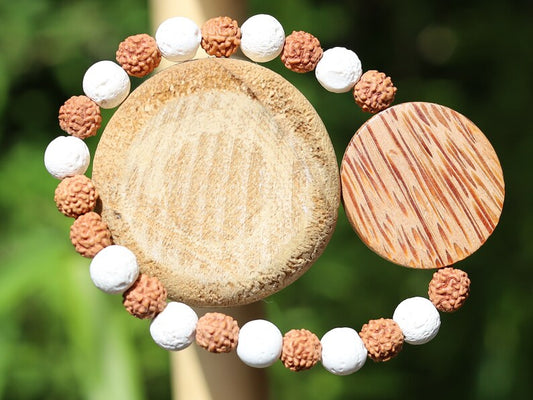 Beautiful, large Palm Wood bead with Lava and Round Rudraksha beads. Overall, white lava beads offer a unique  element to jewelry designs