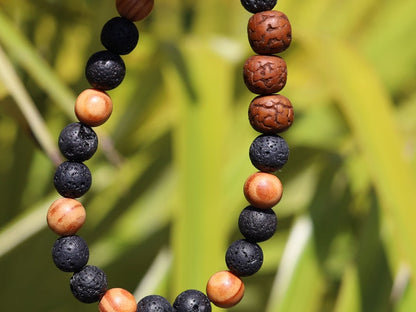 Polished Rudraksha bracelet with Raja Kayu and Lav beads.  the Supreme King in the forest among all different pieces of trees