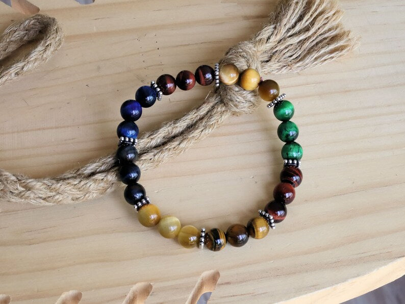 Multi colored tiger eye bead bracelet combined with FLAT SQUARE tibetan Style Alloy Pearl Spacer Discs. Outstanding and Astonishing.