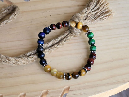 Multi colored tiger eye bead bracelet combined with FLAT SQUARE tibetan Style Alloy Pearl Spacer Discs. Outstanding and Astonishing.