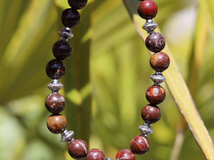 Red Brecciated Jasper bracelet with Tibetan Style Alloy Pearl Spacer Discs. Tibetan alloy material in antique silver.