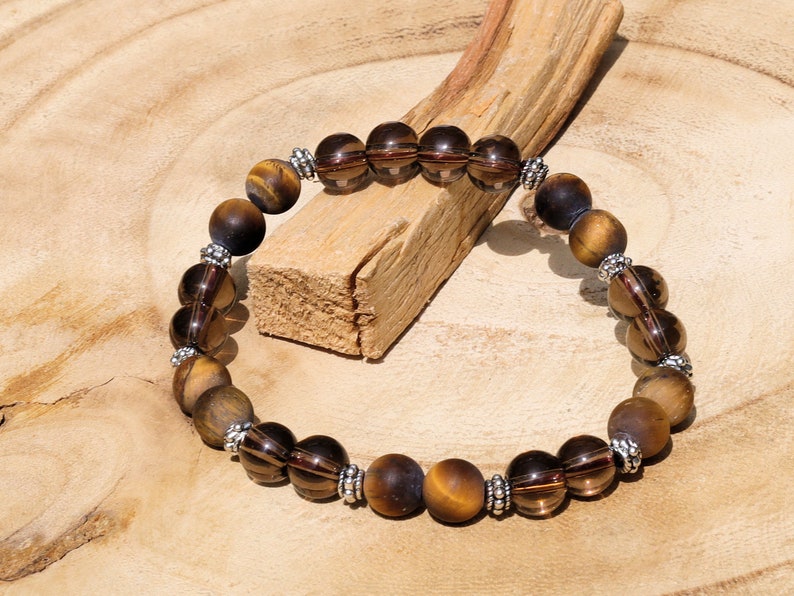 Natural Tiger Eye, Frosted Style Beads with Smoky Quartz Stones. And Tibetan alloy material in antique silver. Exquisite workmanship