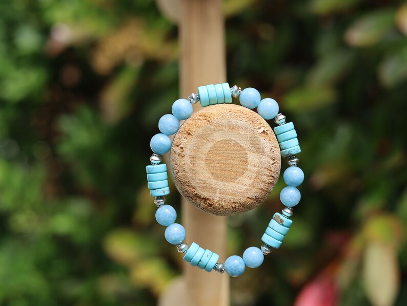 Stabilized Turquoise Gemstone Heishi Beads with Aquamarine Agate Stone Beads.  It is a design that stands out and captures attention