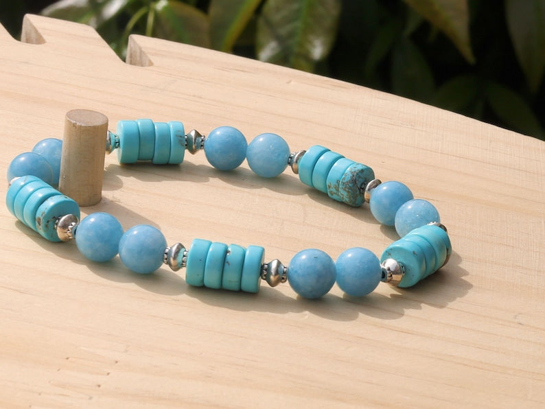 Stabilized Turquoise Gemstone Heishi Beads with Aquamarine Agate Stone Beads.  It is a design that stands out and captures attention