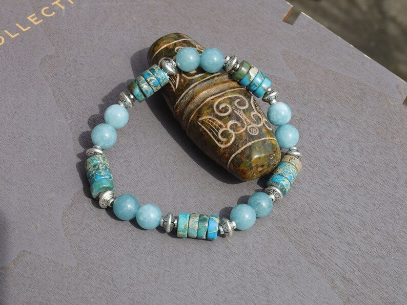 Unique Sea Sediment Jasper Gemstone Heishi Spacer bracelet with aquamarine beads.  a combination of imagination, experimentation