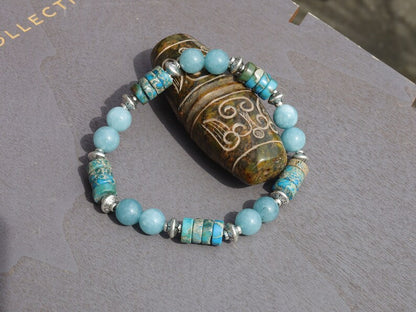 Unique Sea Sediment Jasper Gemstone Heishi Spacer bracelet with aquamarine beads.  a combination of imagination, experimentation