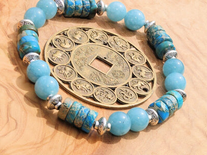 Unique Sea Sediment Jasper Gemstone Heishi Spacer bracelet with aquamarine beads.  a combination of imagination, experimentation