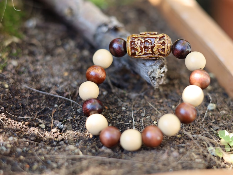 Wooden Spiral bead combined with maple and hornbeam wood. Cultural or Spiritual Significance. a form of self-expression
