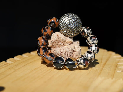 Unique Silver color metal look coin with cable motif with mixed rare  Leather Beads. it can symbolize a connection to the natural world