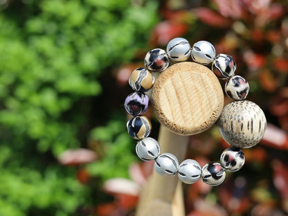 Unique big Palmwood ball brown/ grey, 29 mm with mixed rare Leather Beads. it can symbolize a connection to the natural world