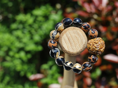 Chunk bead light brown stone covered with different light brown colored stones. Combined with Mixed colors Leather Beads.