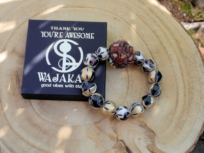 Chunk bead brown stone covered with different light brown colored stones. Combined with Mixed colors Leather Beads.