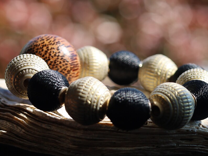Unique big Palmwood ball warm brown/ grey, 29 mm with Fashionable Stone beads. Material: Stone. Size approx 18mm.