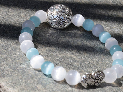 White Line Collection: Blue and white Cat's Eye Selenite bracelet with Tibetan Style Alloy Beads and a Pixiu