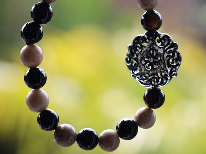 Maifanite/Maifan Stone Beaded bracelet with Black Banded Agate Onyx . With A beautiful large acrylic bead in 'Lace' look