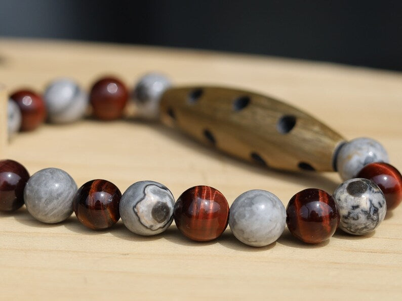A beautiful large Horn bead with  Picasso Jasper  and red tiger eye beads. express your individuality and unique style.