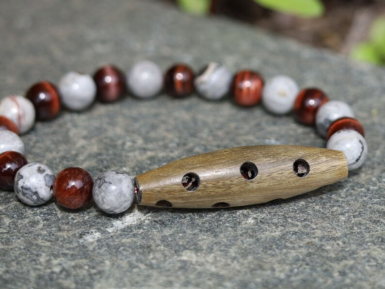 A beautiful large Horn bead with  Picasso Jasper  and red tiger eye beads. express your individuality and unique style.