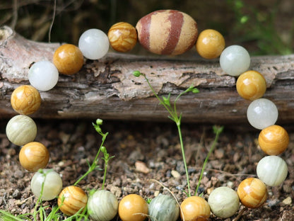 Sesame Jasper/Kiwi Jasper Beads bracelet with Wood lace Agate beads and egg shaped Terracotta bead. and is sure to make you smile