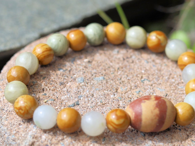 Sesame Jasper/Kiwi Jasper Beads bracelet with Wood lace Agate beads and egg shaped Terracotta bead. and is sure to make you smile