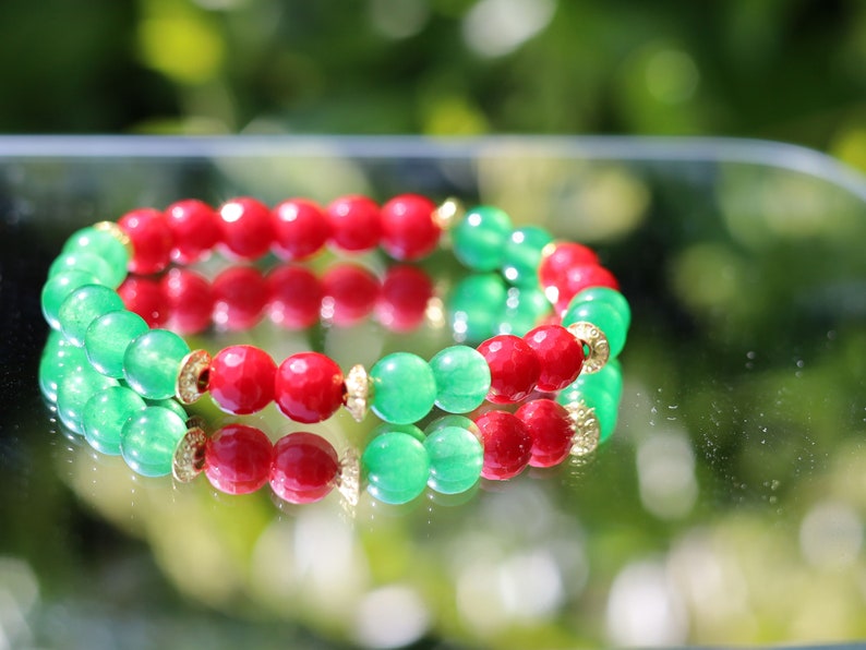 Natural Faceted Red Coral Stone bracelet with Green  Jade and Tibetan Style Alloy Spacer Discs.  Exquisite workmanship and great design!