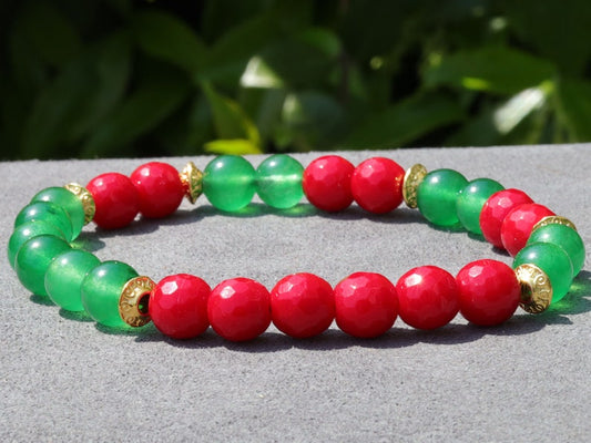 Natural Faceted Red Coral Stone bracelet with Green  Jade and Tibetan Style Alloy Spacer Discs.  Exquisite workmanship and great design!