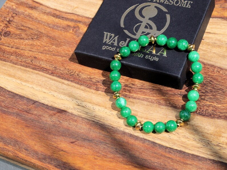 Natural Green Lace Jade with Tibetan Style Alloy Spacer Discs. is associated with balancing emotions, promoting harmony