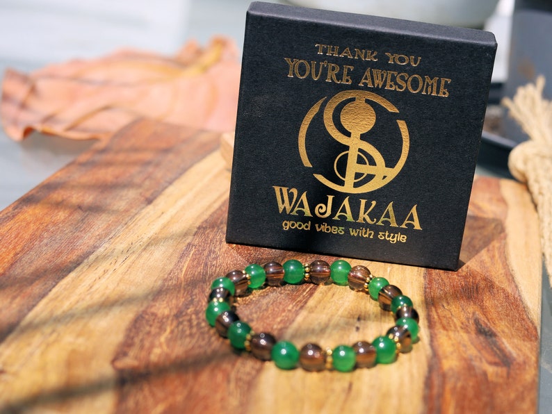 Smoky quartz bracelet with Green jade and Tibetan alloy material in Antique Gold. often associated with stability, protection