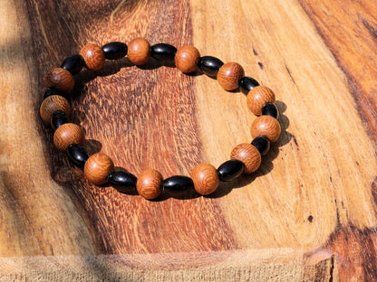 Unique Madre de Cacao Wood bracelet combined with Natural Black Agate Barrel Beads. Most favored botanical medicines in South America