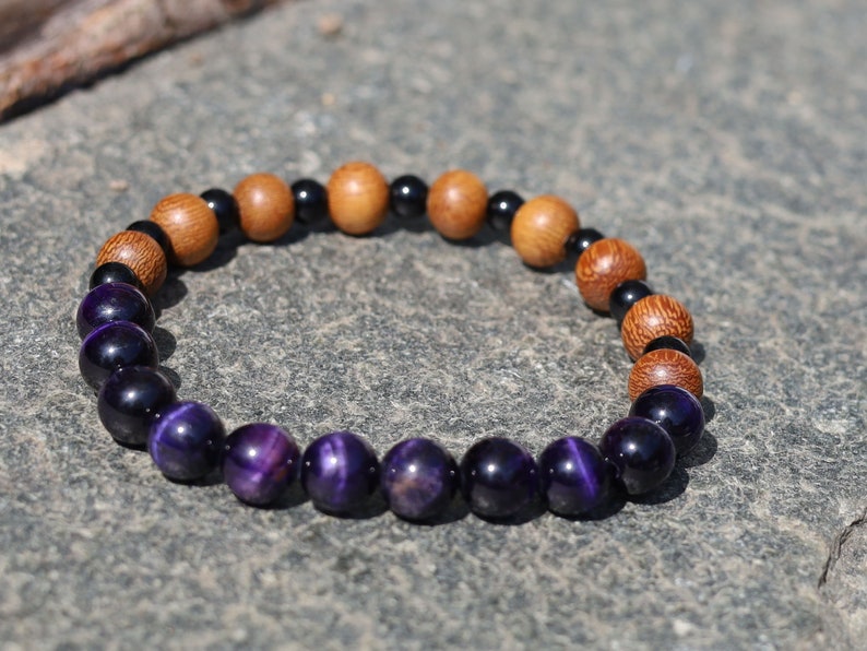 Unique Madre de Cacao Wood bracelet combined with Purple Tiger Eye, also known as Falcon's Eye or Hawk's Eye.