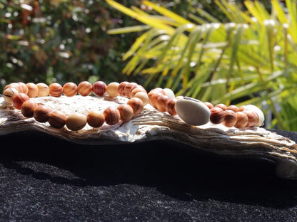 Wooden Bracelet Set. Raja Kayu matte beaded bracelets with Acai broken white seeds and Huayruro white 20mm seeds beads.