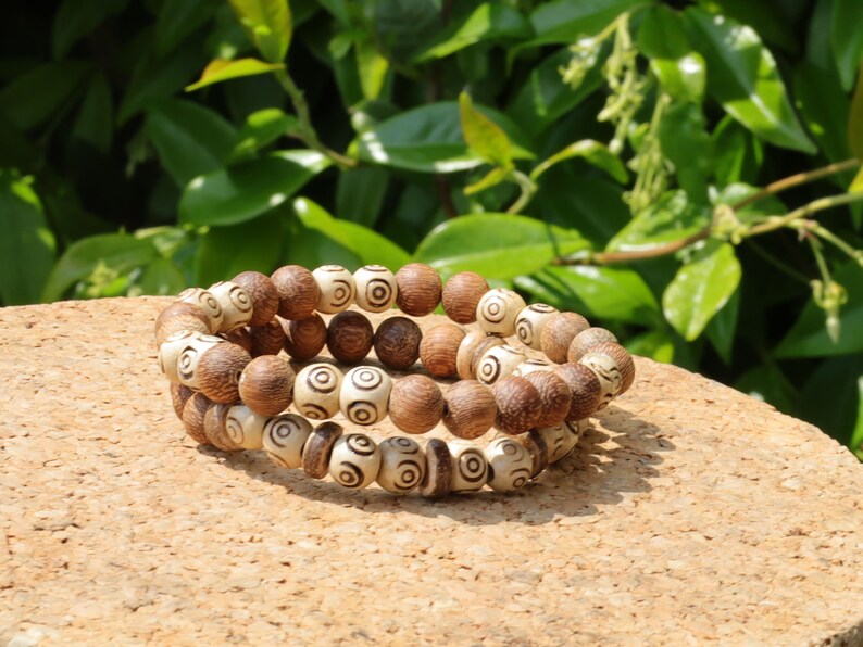 Wooden Bracelet set. Madre de Cacao Wood beads and Wooden beads with spiral. can represent growth, progression, and transformation