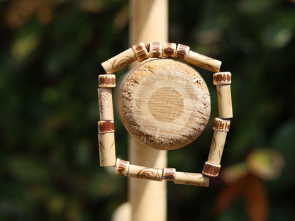 Bamboo bead wave. beige/sand color. Format: 16 mm x 6 mm. Beads made of bamboo with a nice print.