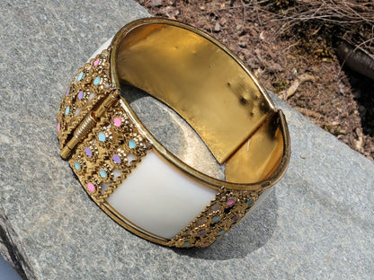 Kriaa Gold Plated Multicolor Stone Kada. Indian jewelry is known for its intricate designs and rich cultural significance.