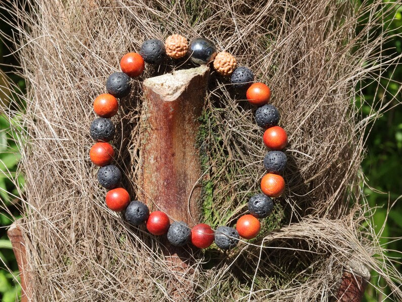 Super bead Leklai bracelet combined with Lava beads and Sandalwood Beads. And with Round Rudraksha beads.