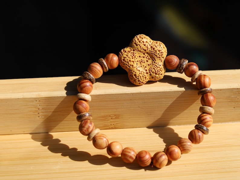 Raja Kayu or Kayu Raja, King of wood bracelet with Beautiful & Large Lava Rock bead. Combined with  beautiful Disc coconut beads.