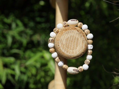 Huayruro white beads bracelet with white Lava and Wooden beads with spiral..offer a unique and natural element to jewelry